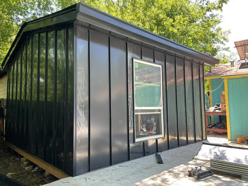 Black standing seam metal wall panels for Roof Inspection in Southern Pines
